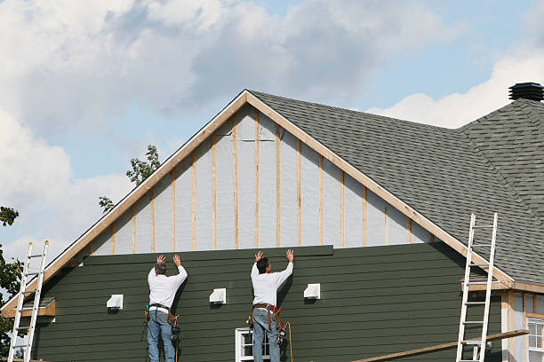 Professional Vinyl Siding technician working in Sterling, VA